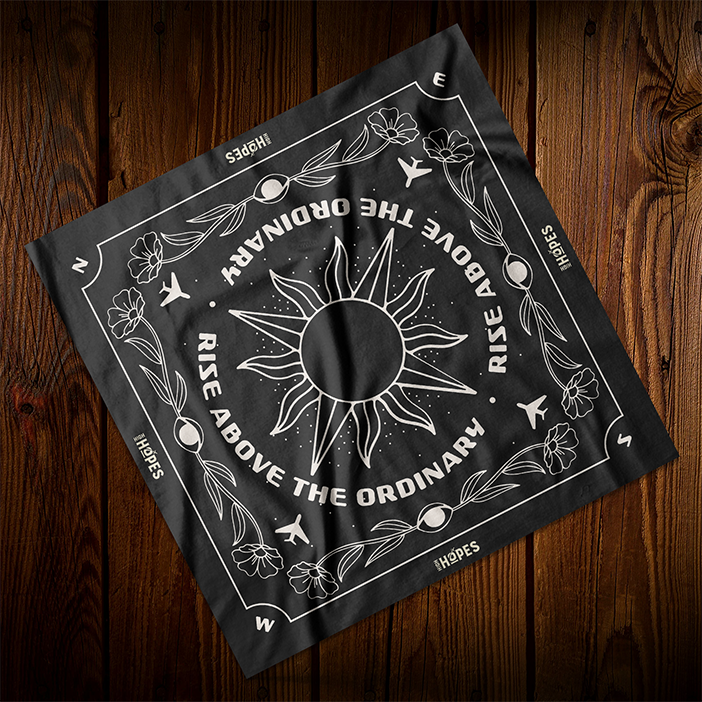 Black Bandana Design with White illustration of sun, clouds, and compass